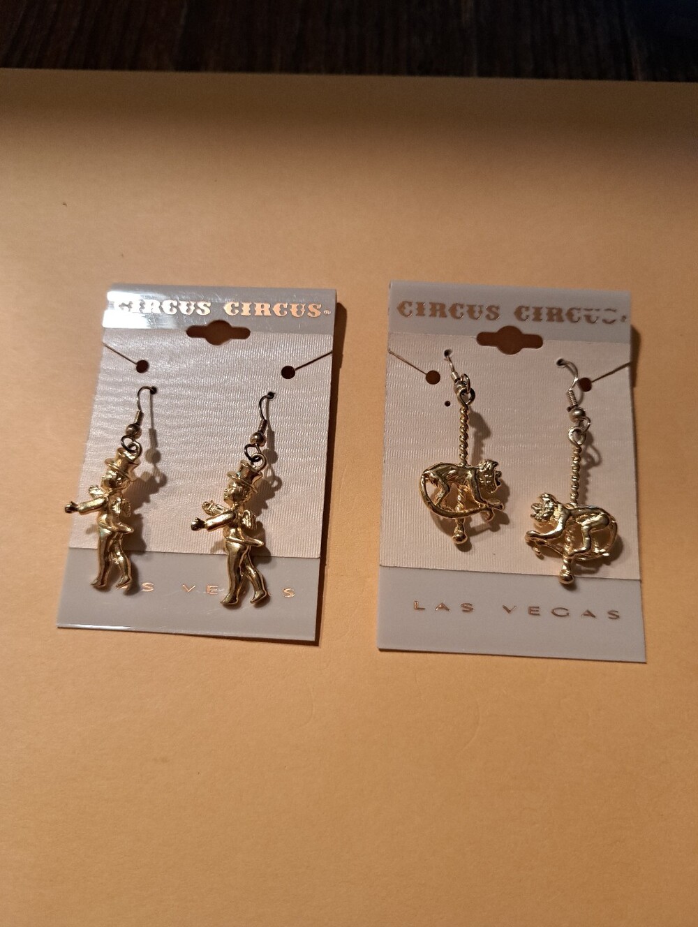New Circus Circus Las Vegas Gold Tone Flying Cupid And Carousel Monkey Earrings